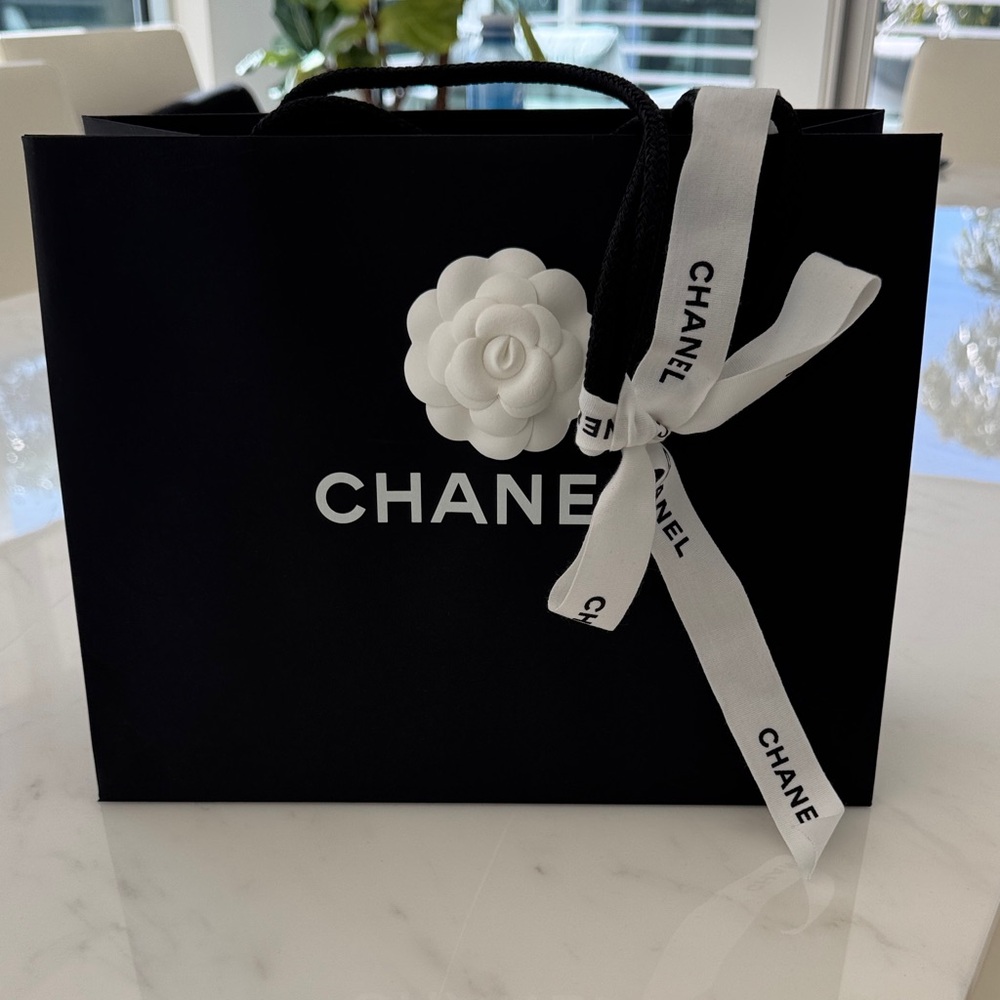 Chanel Black Bag with White Camellia and Ribbon